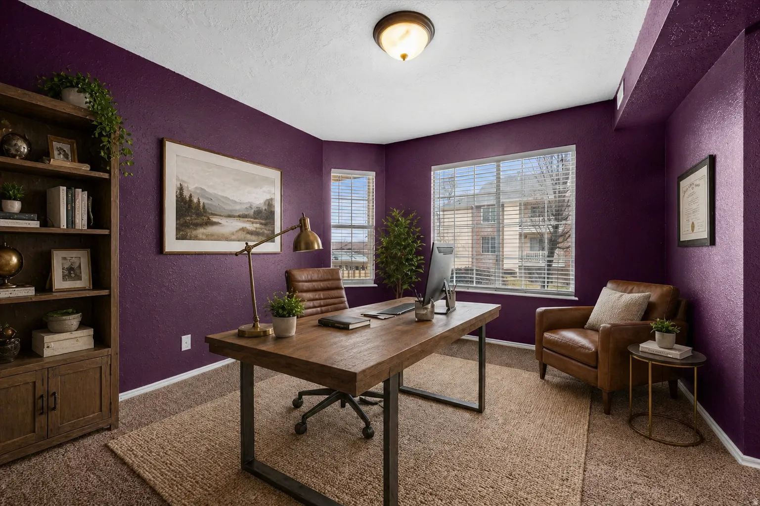 Carpeted office with a textured wall and a textured ceiling