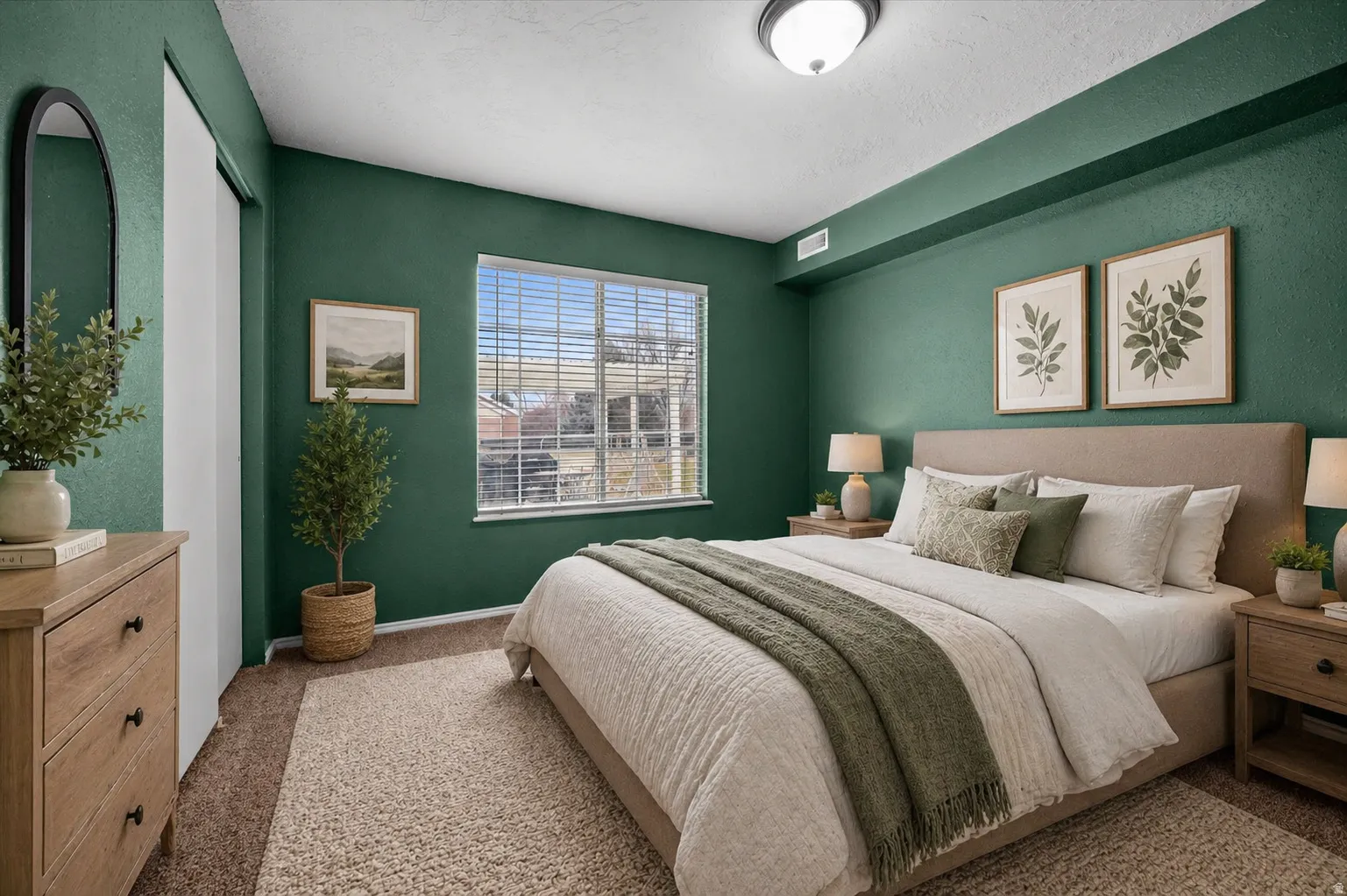 Carpeted bedroom with baseboards