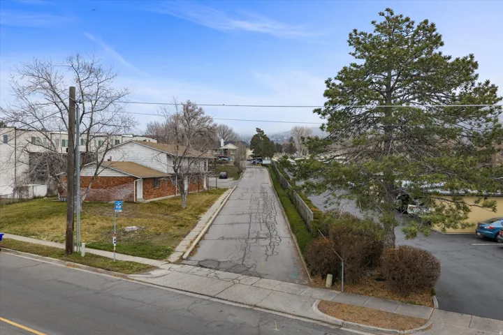 View of front of property featuring brick siding and a residential view
