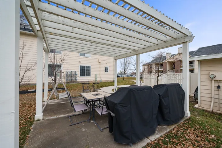 View of patio / terrace with a pergola, grilling area, and outdoor dining area