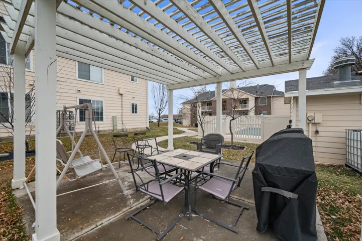 View of patio / terrace with a pergola, grilling area, and outdoor dining area