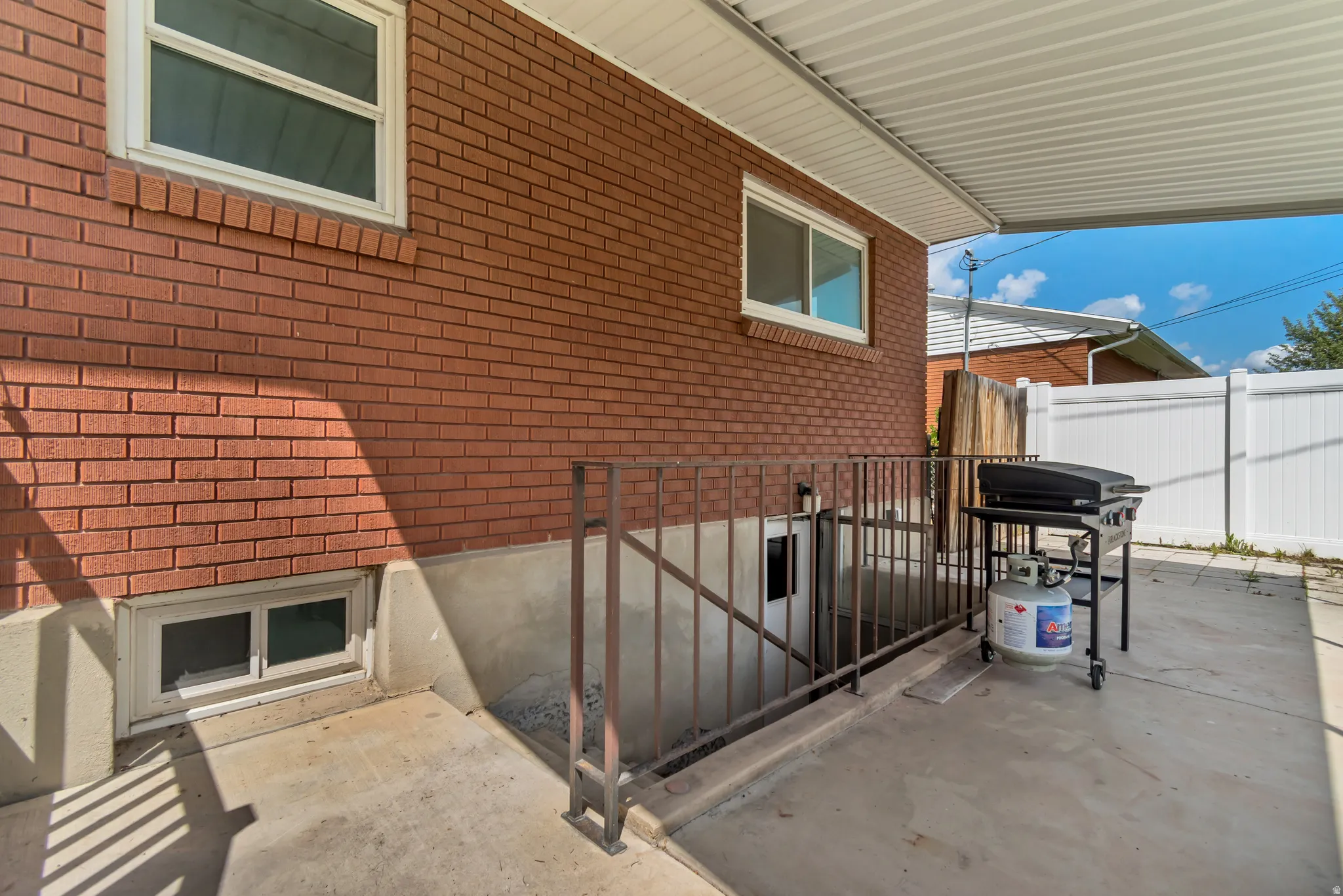 Basement entrance with covered stairwell