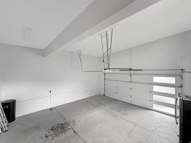 Finished Attached Garage, Supersized for TOYS. Garage Fridge Excluded