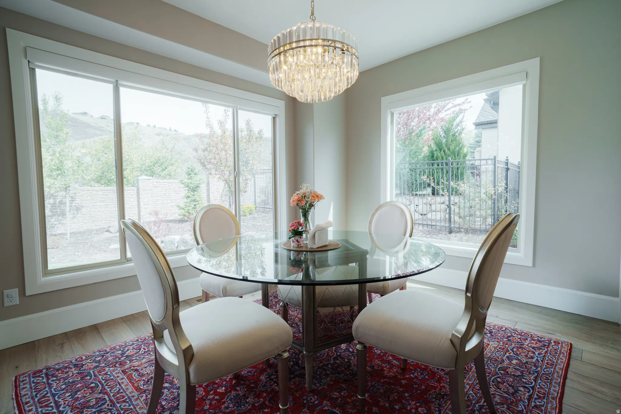 Dining space featuring hanging lights and wood finished floors