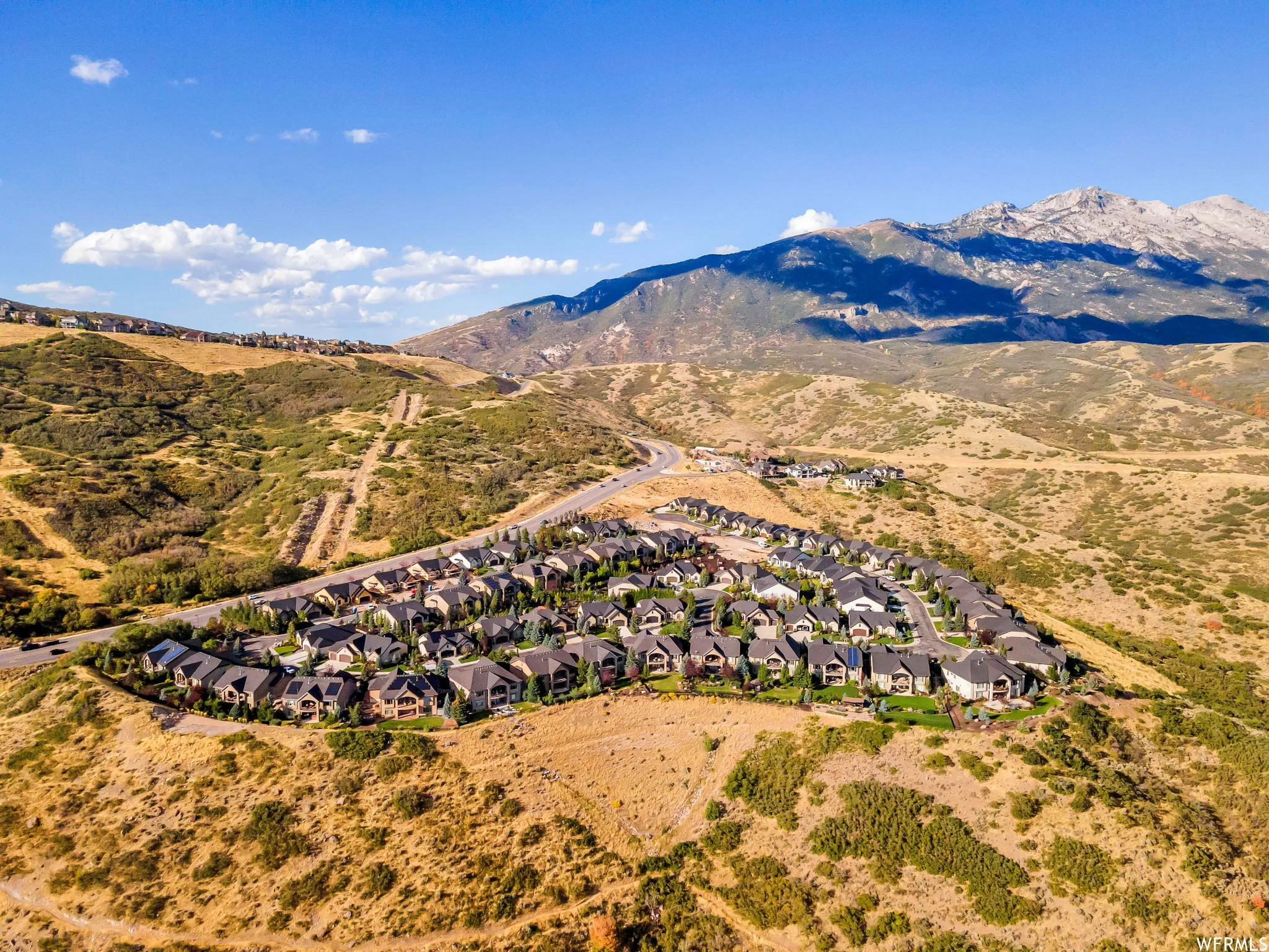 Aerial view of residential area with a mountain backdrop