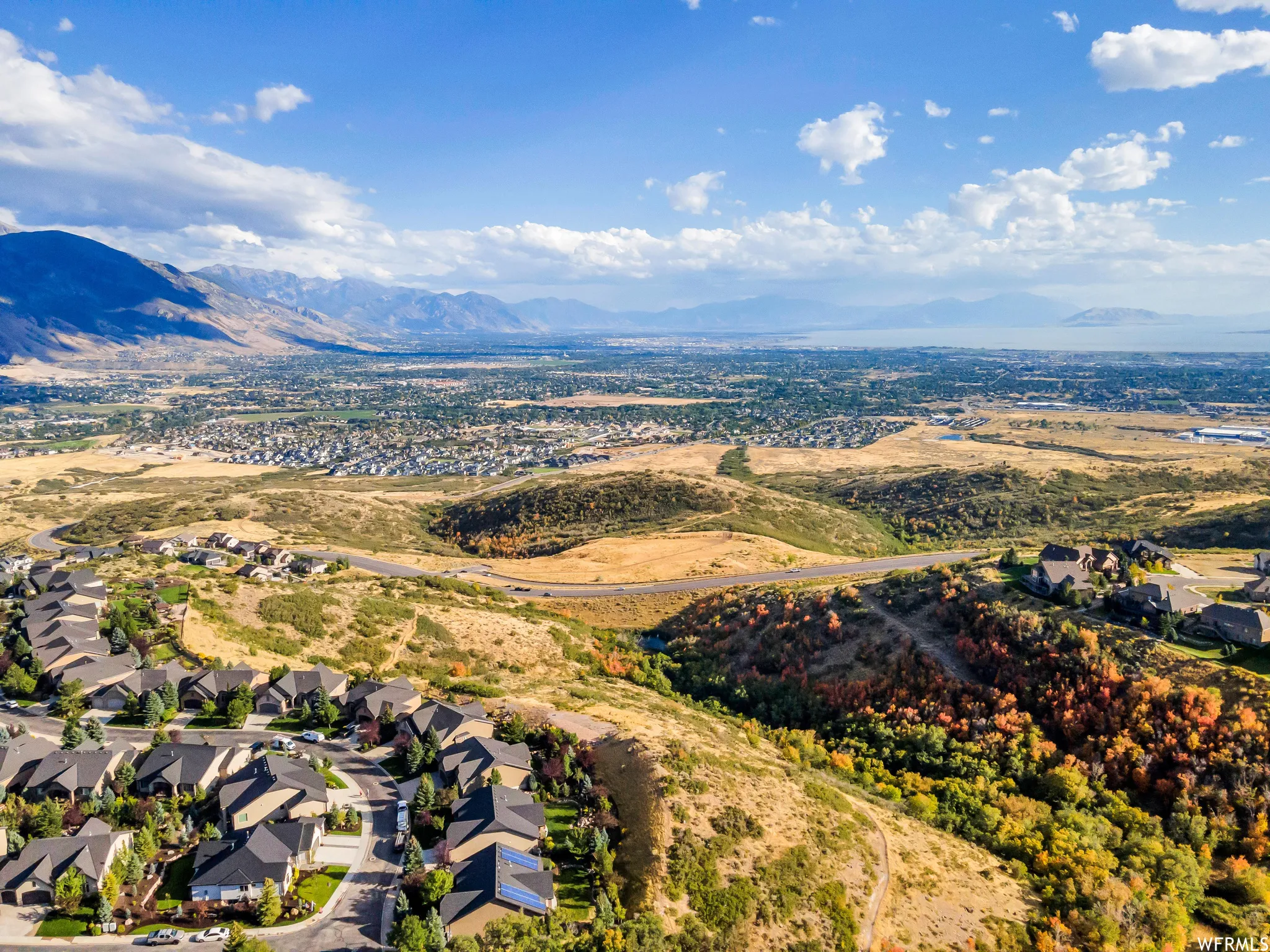 Aerial perspective of suburban area featuring mountains