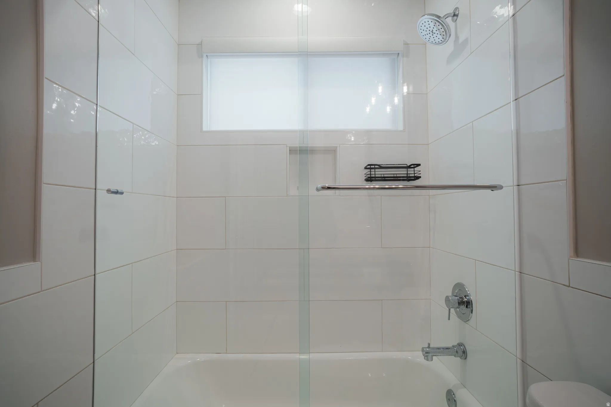 Full bath with toilet and  shower combination