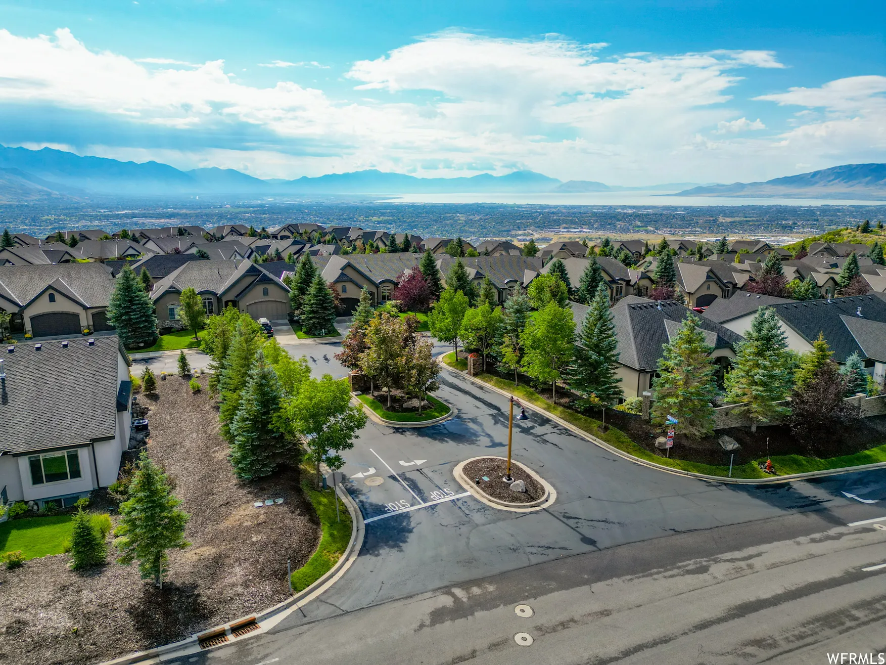Aerial perspective of suburban area featuring mountains