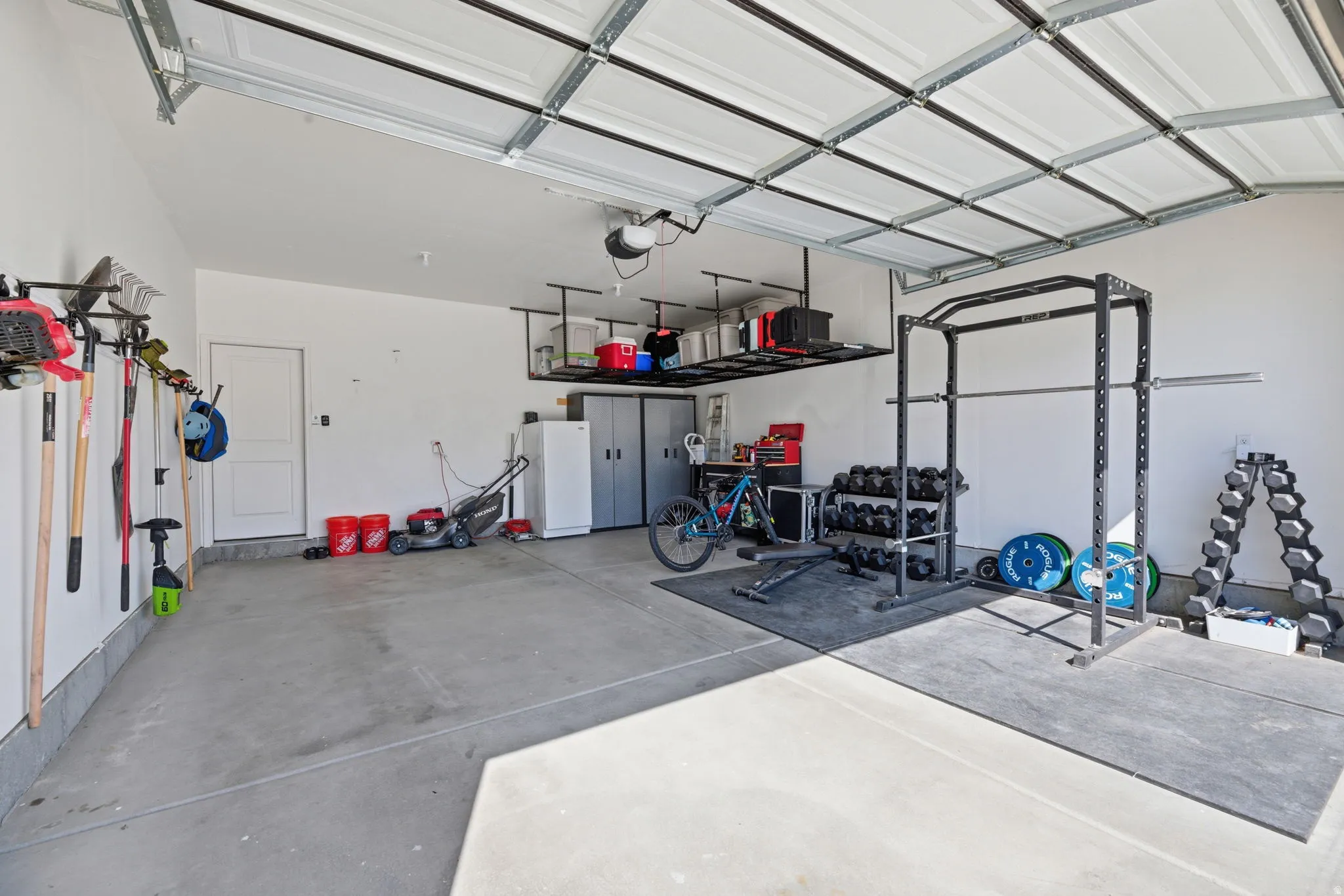 Finished Garage w/Ceiling Storage Racks!