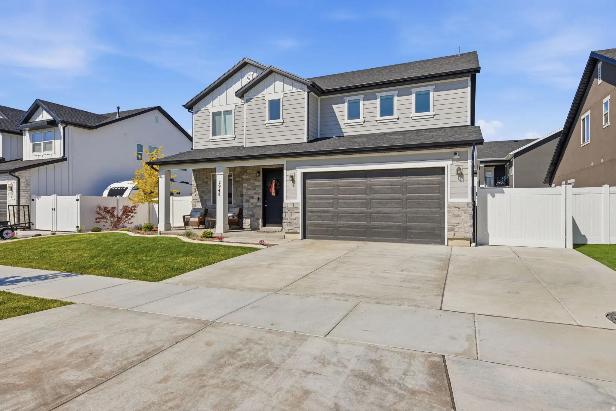 Beautiful Front View of the Home Fully Landscaped w/Extra Parking Area