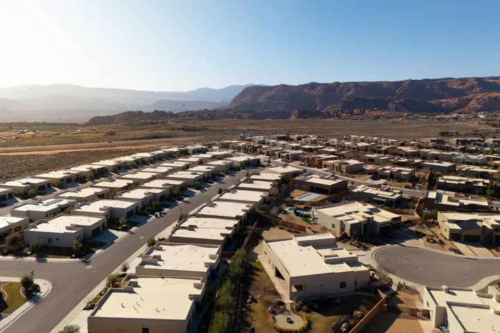 Aerial perspective of suburban area featuring mountains