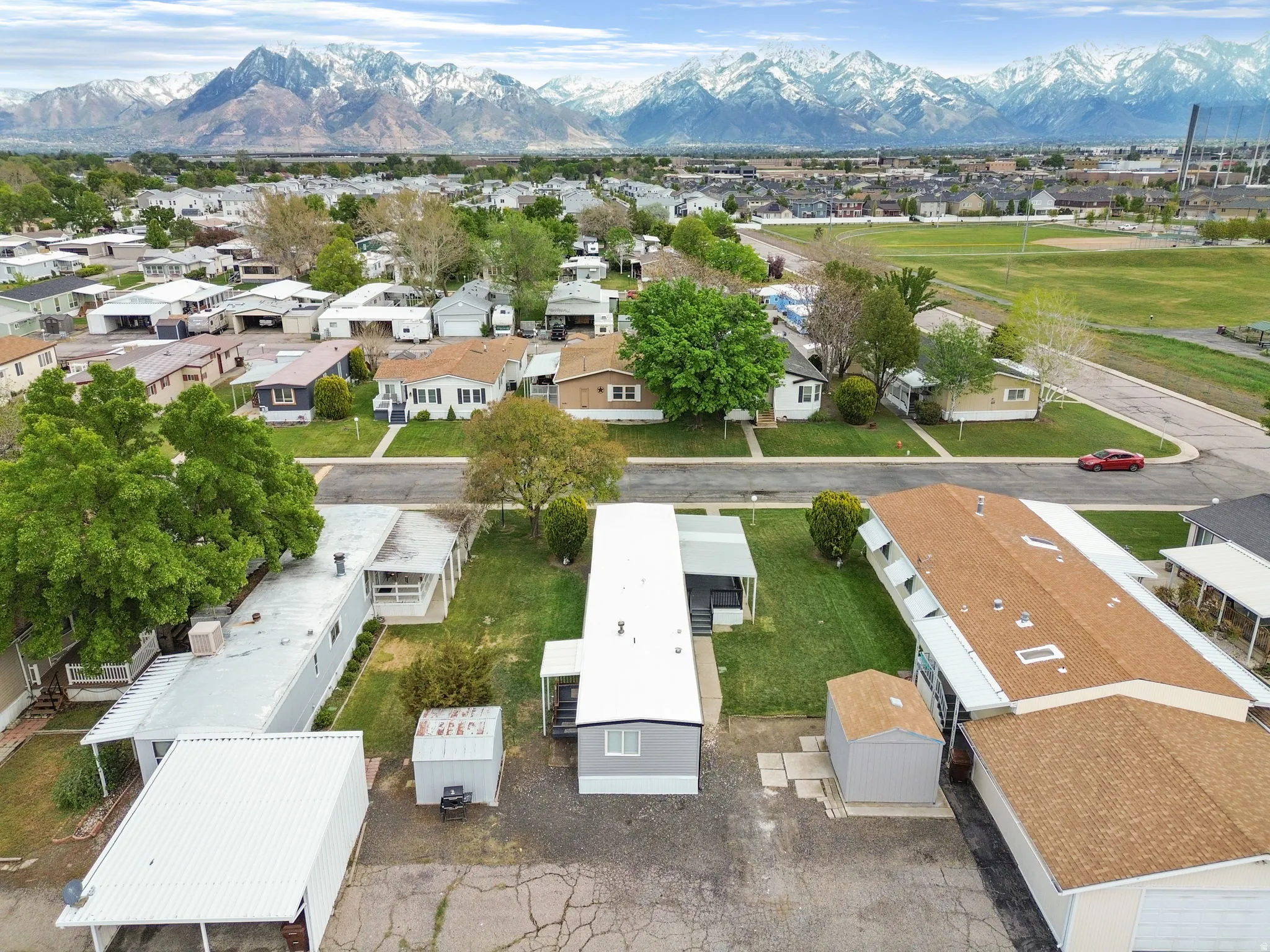 Aerial perspective of suburban area featuring mountains