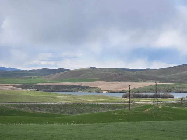 View of property's community with a water and mountain view