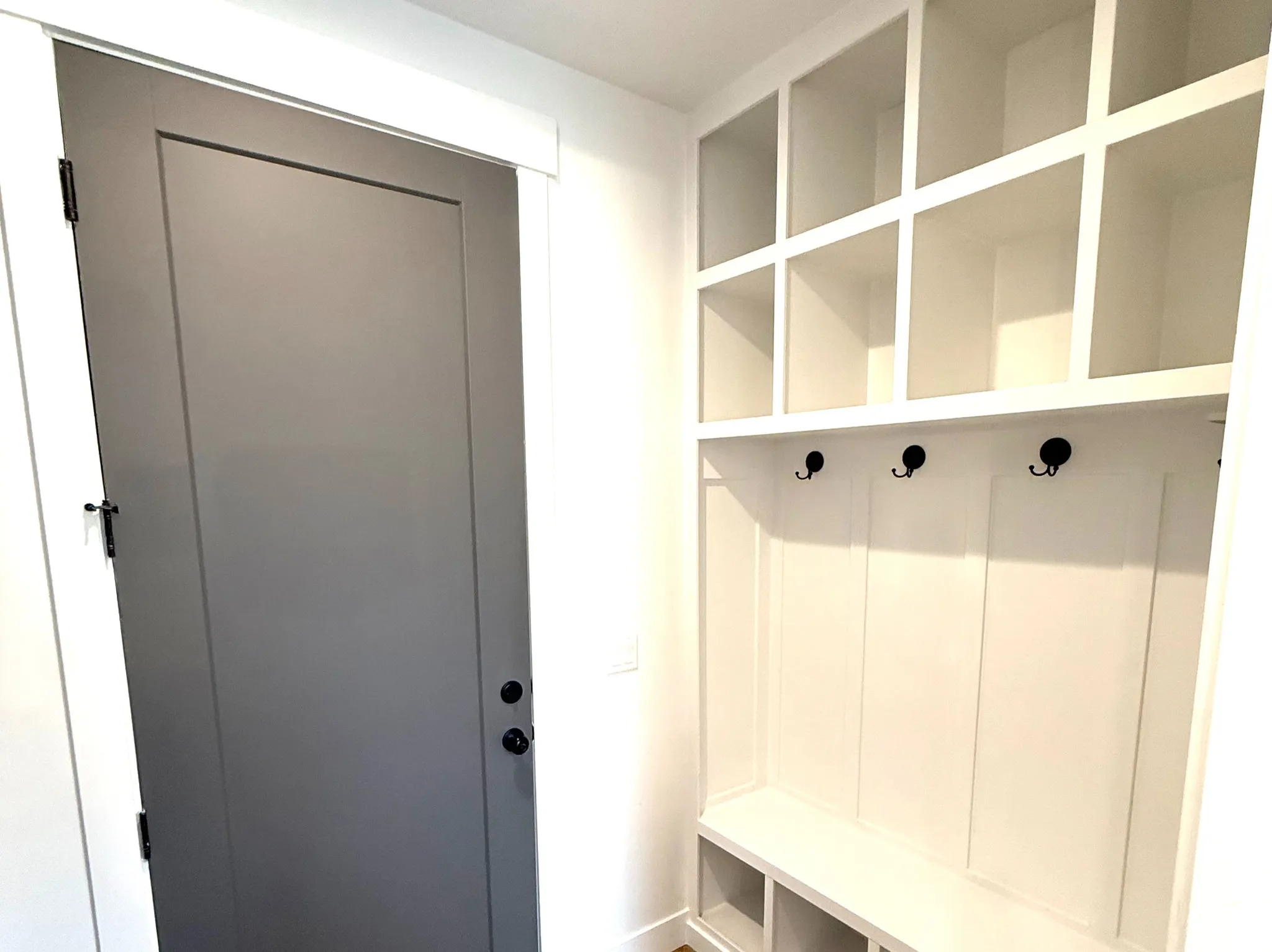 Mudroom featuring light wood-style floors