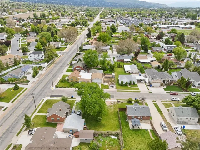 Aerial overview of property's location with nearby suburban area