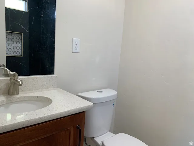 Bathroom with vanity and toilet
