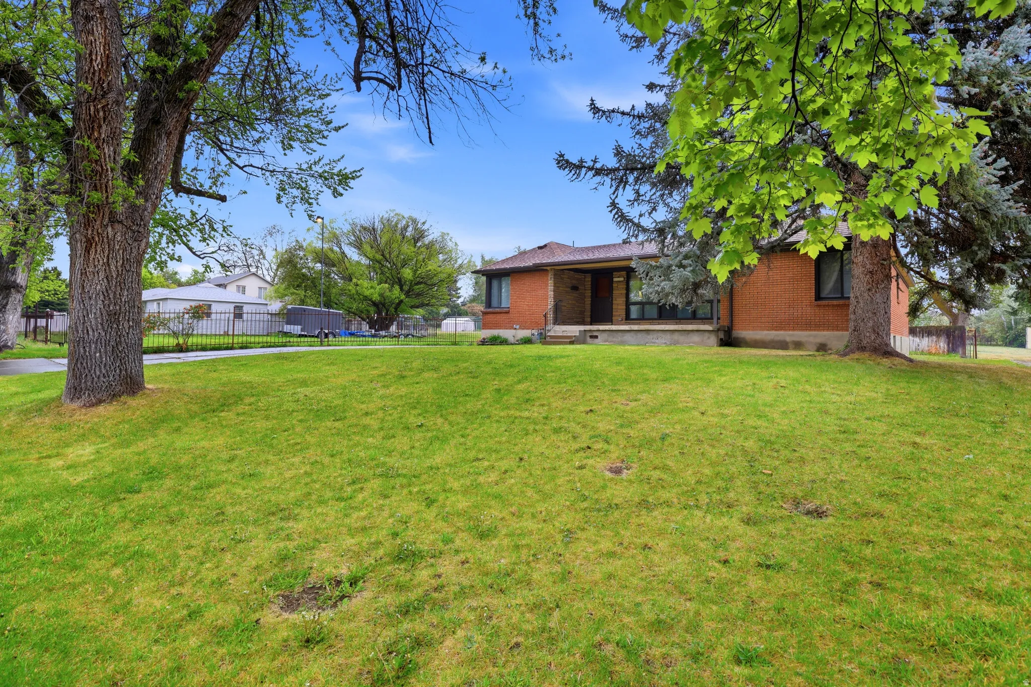 View of yard featuring covered porch