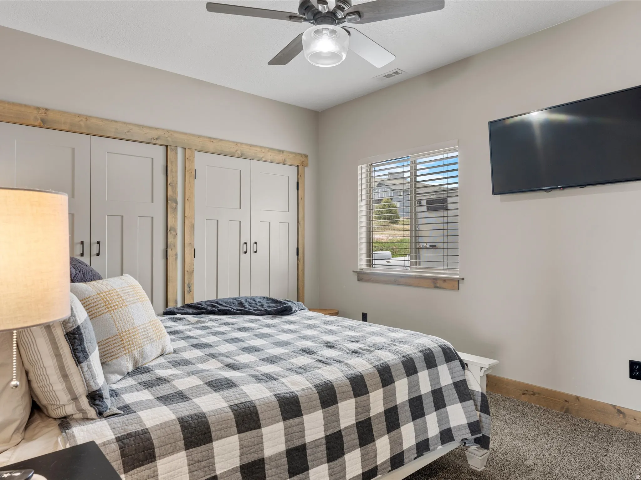 Bedroom featuring baseboards and a ceiling fan