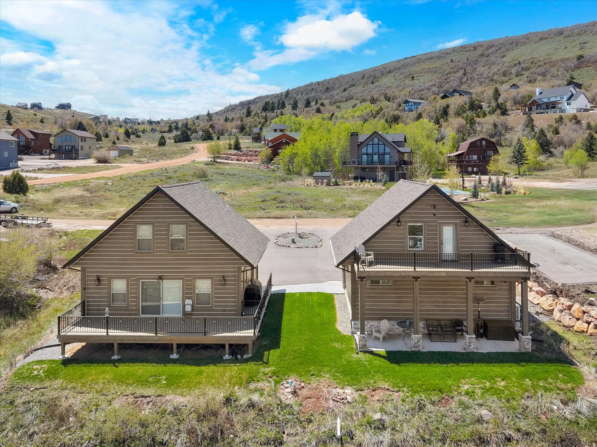 Aerial view of the amazing decks on both the main cabin and the living quarters above the garage