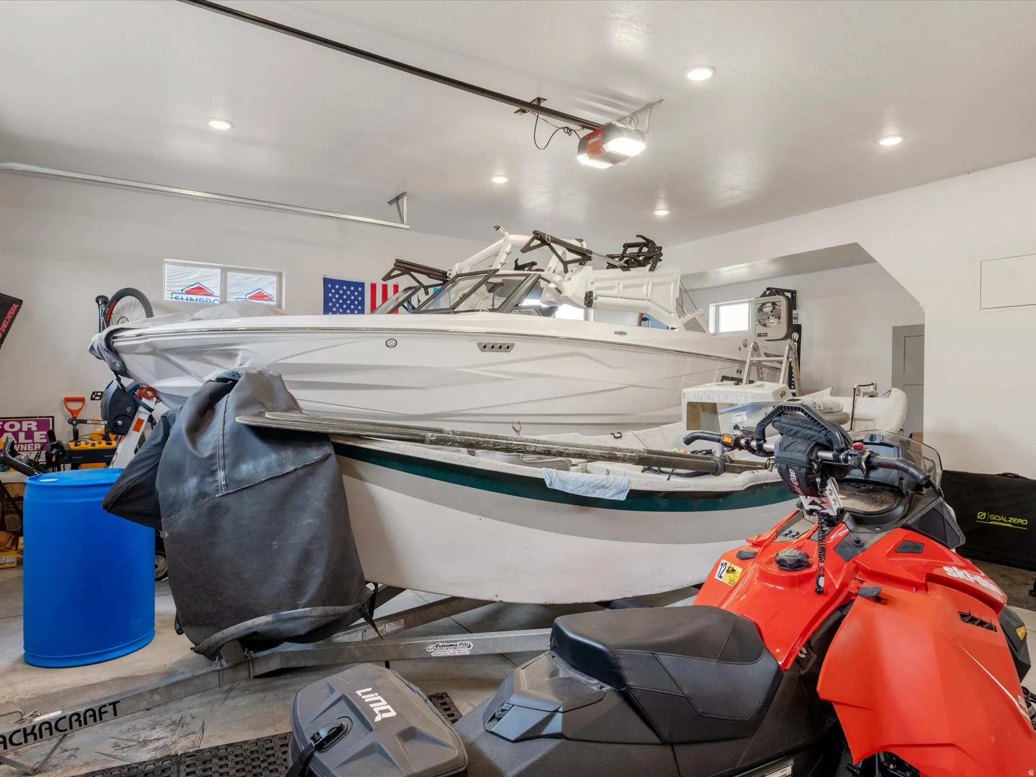 Garage featuring recessed lighting and a garage door opener