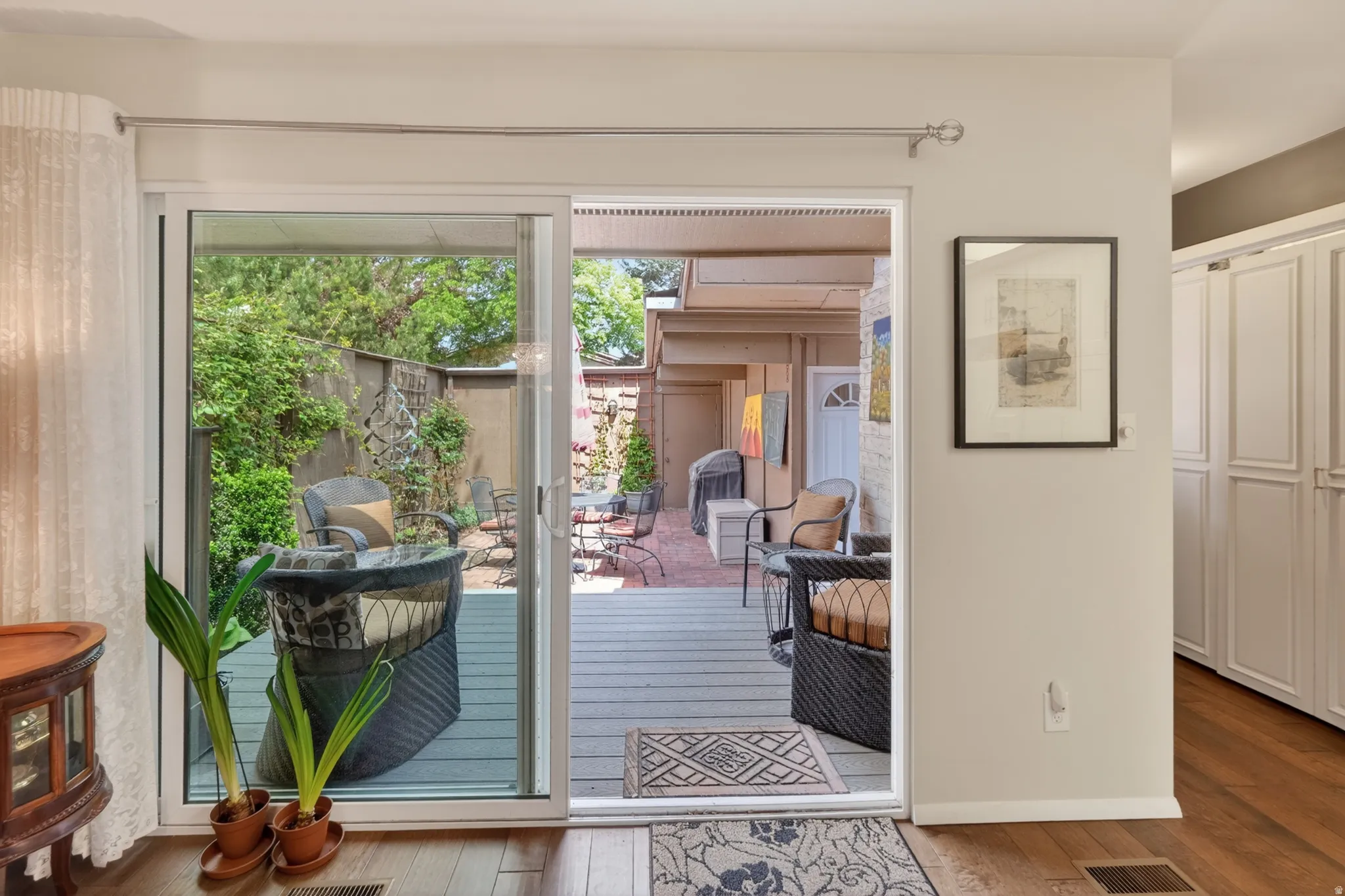 Doorway to outside with hardwood / wood-style floors
