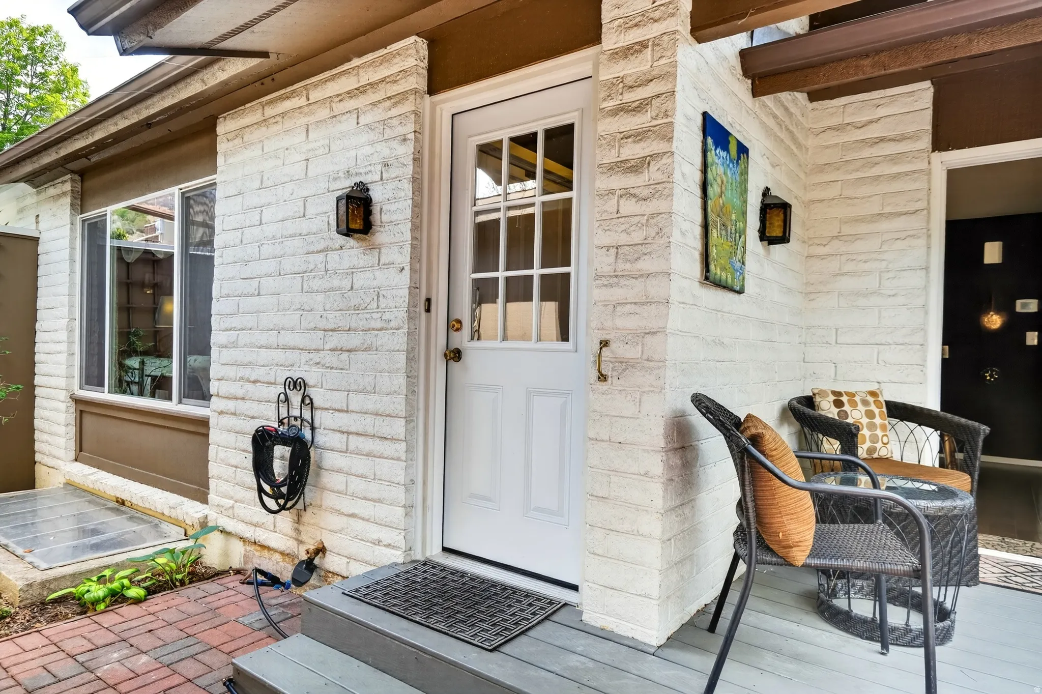 View of exterior entry with stone siding