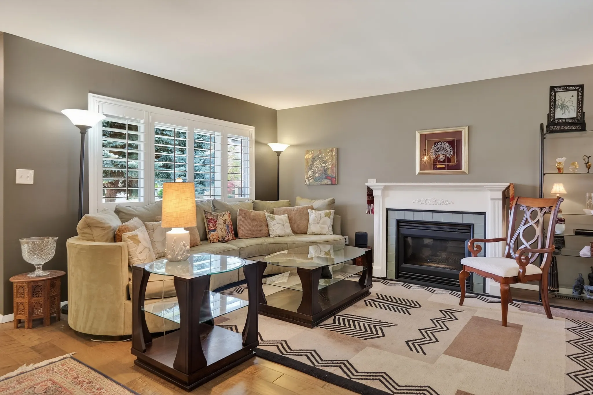 Living room featuring wood finished floors and a fireplace