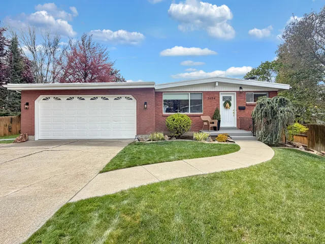 Beautiful mid century modern home on the east bench of Millcreek, tucked in the foothills of Mt. Olympus. 2 car garage, and the most amazing yard.