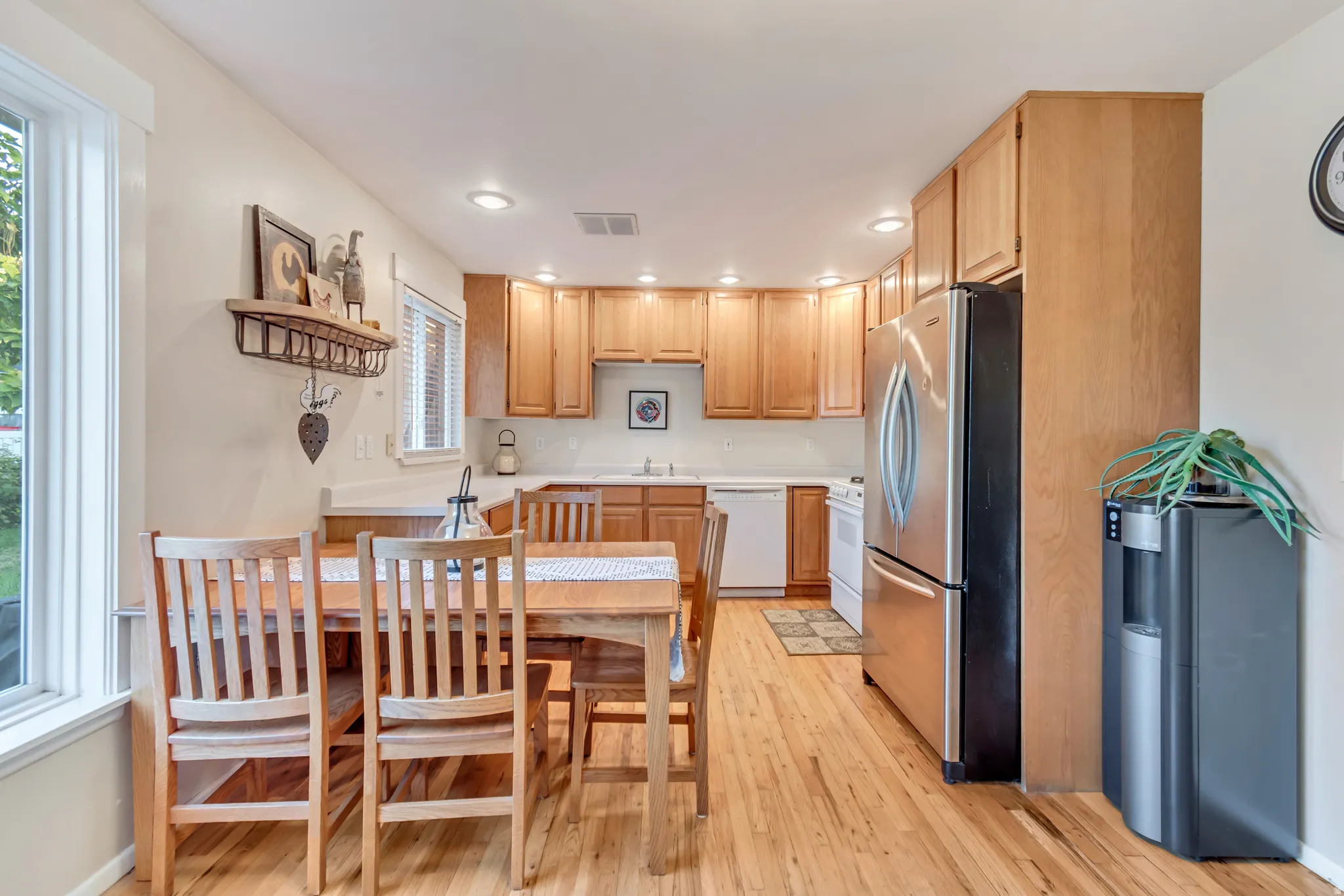 Excellent view looking into the dining and kitchen area.