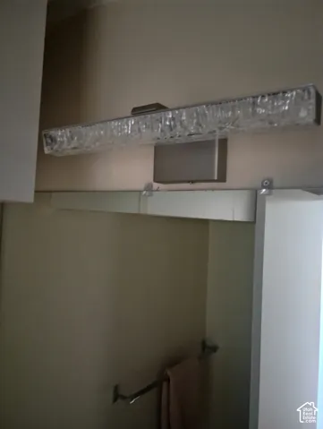 New light fixture in upstairs guest bathroom.
