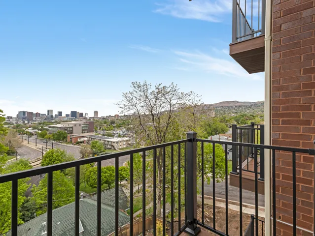 Private balcony facing the city skyline