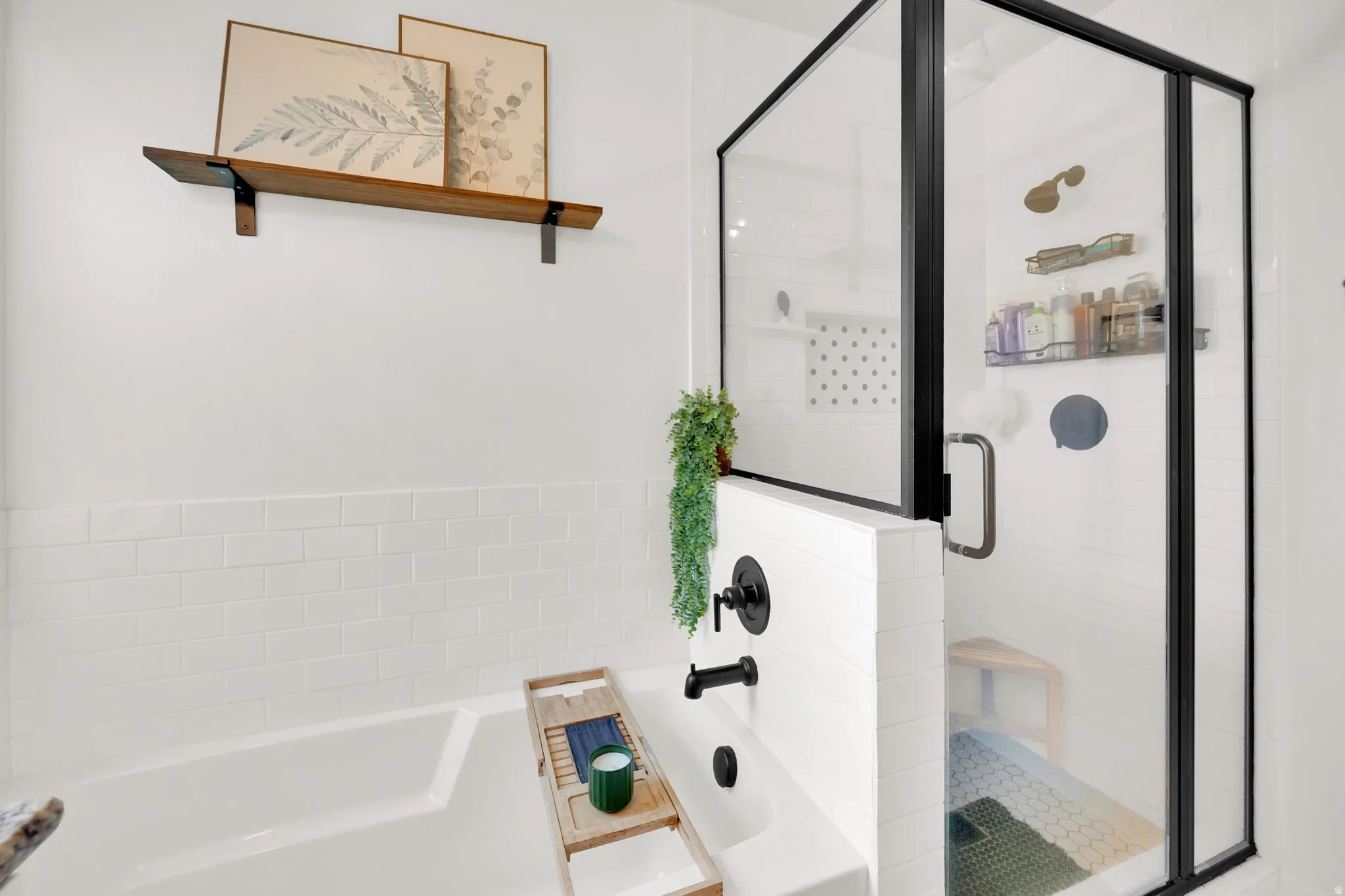 Full bath featuring a garden tub, a shower stall, and pet washing station