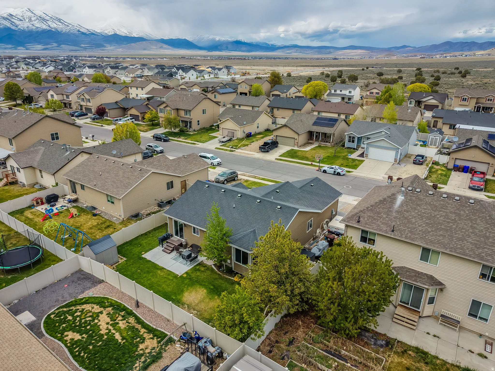 Aerial view of residential area with mountains