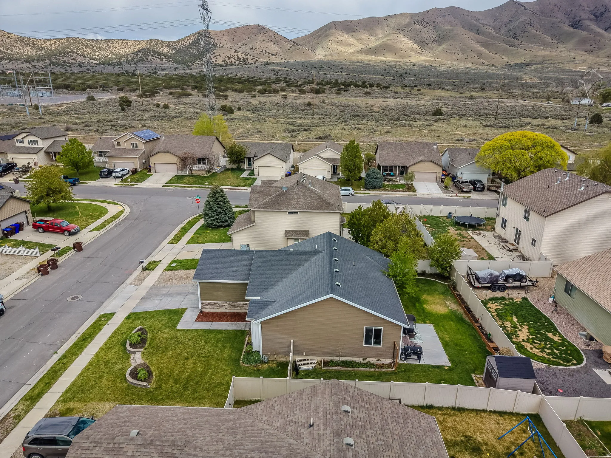 Aerial view of residential area with a mountain backdrop