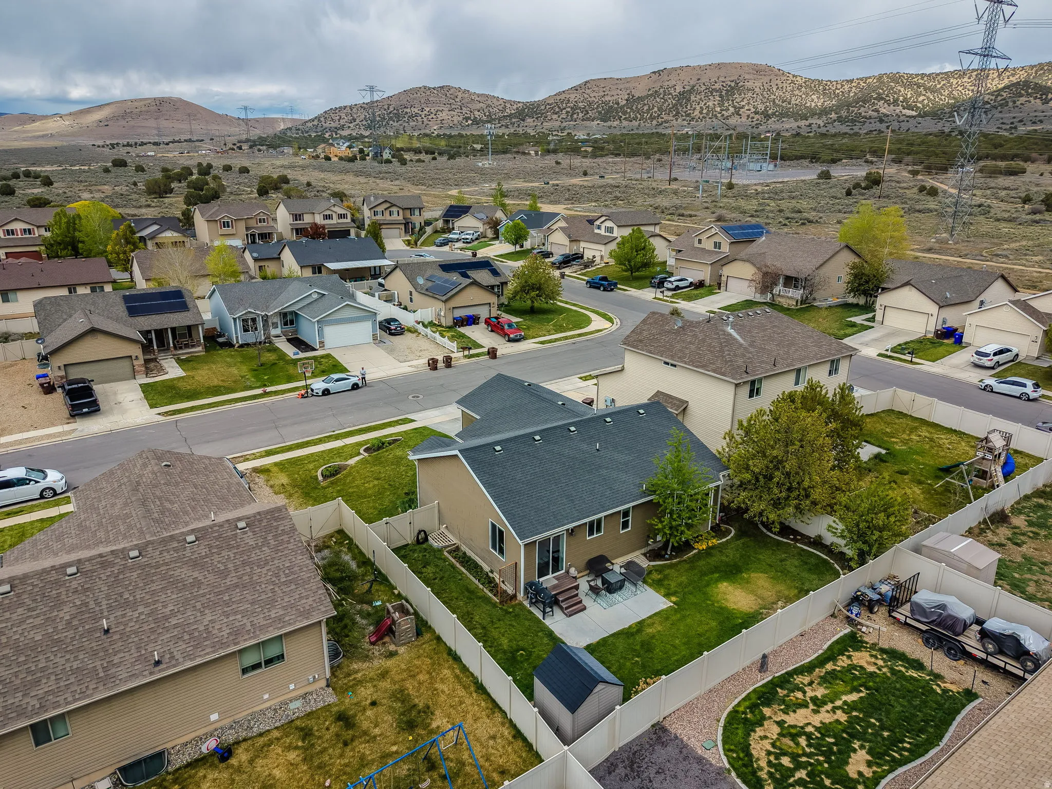 Aerial perspective of suburban area featuring mountains