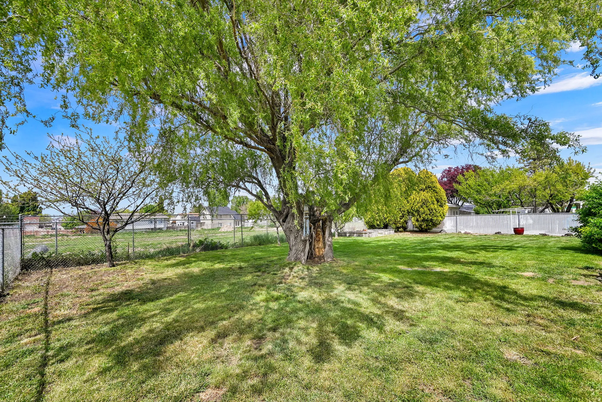 Beautiful mature trees provide lots of shade