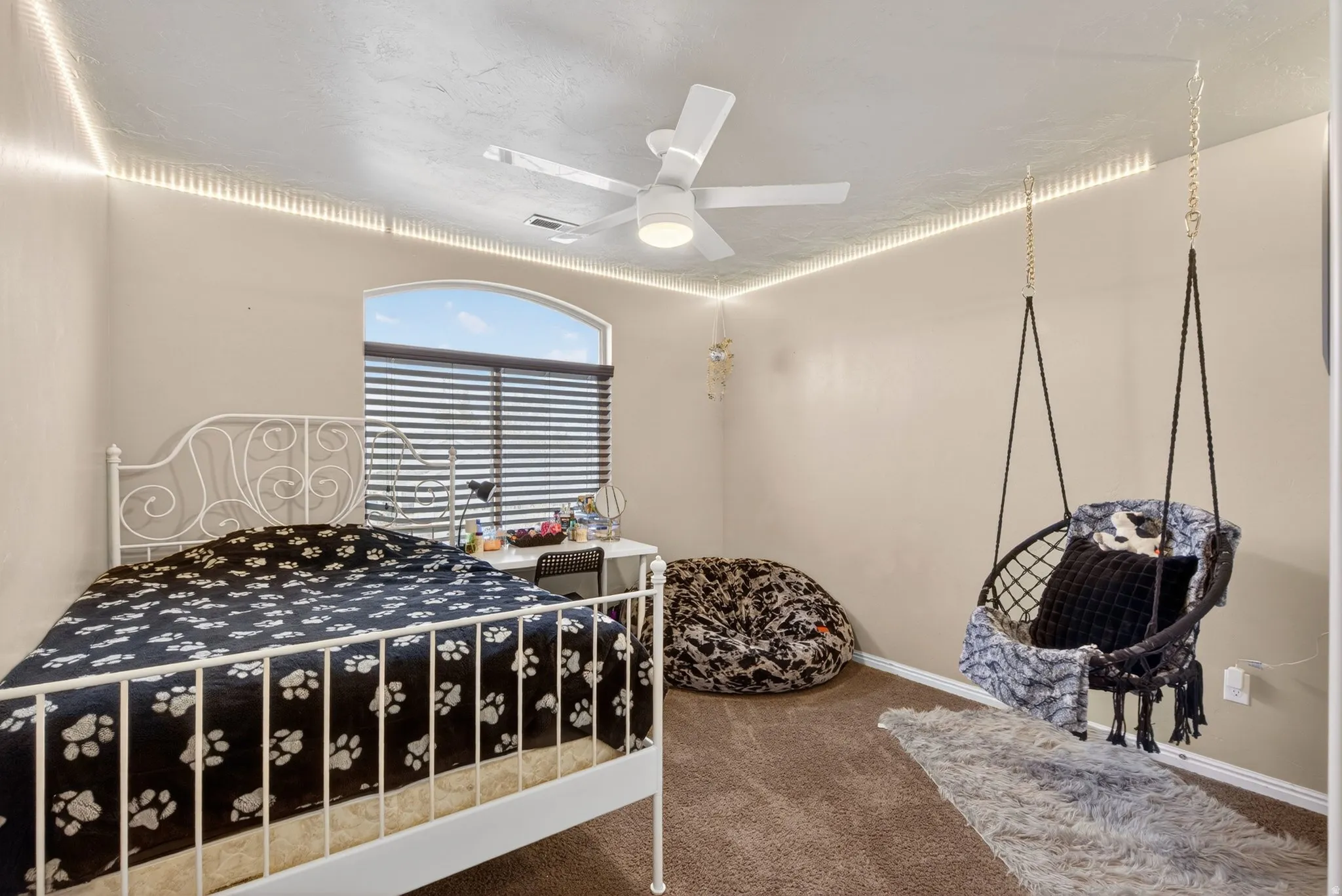 Bedroom featuring carpet floors and a ceiling fan