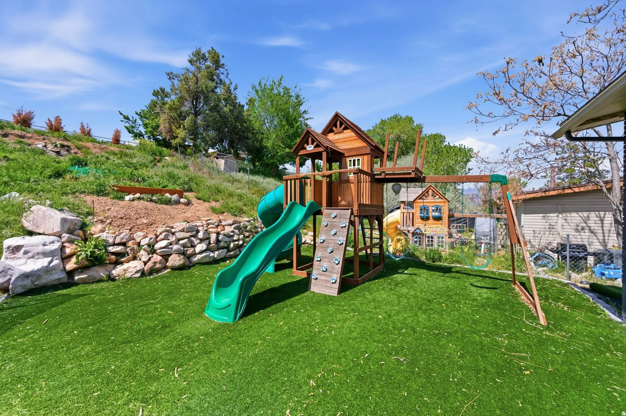 View of jungle gym featuring a yard