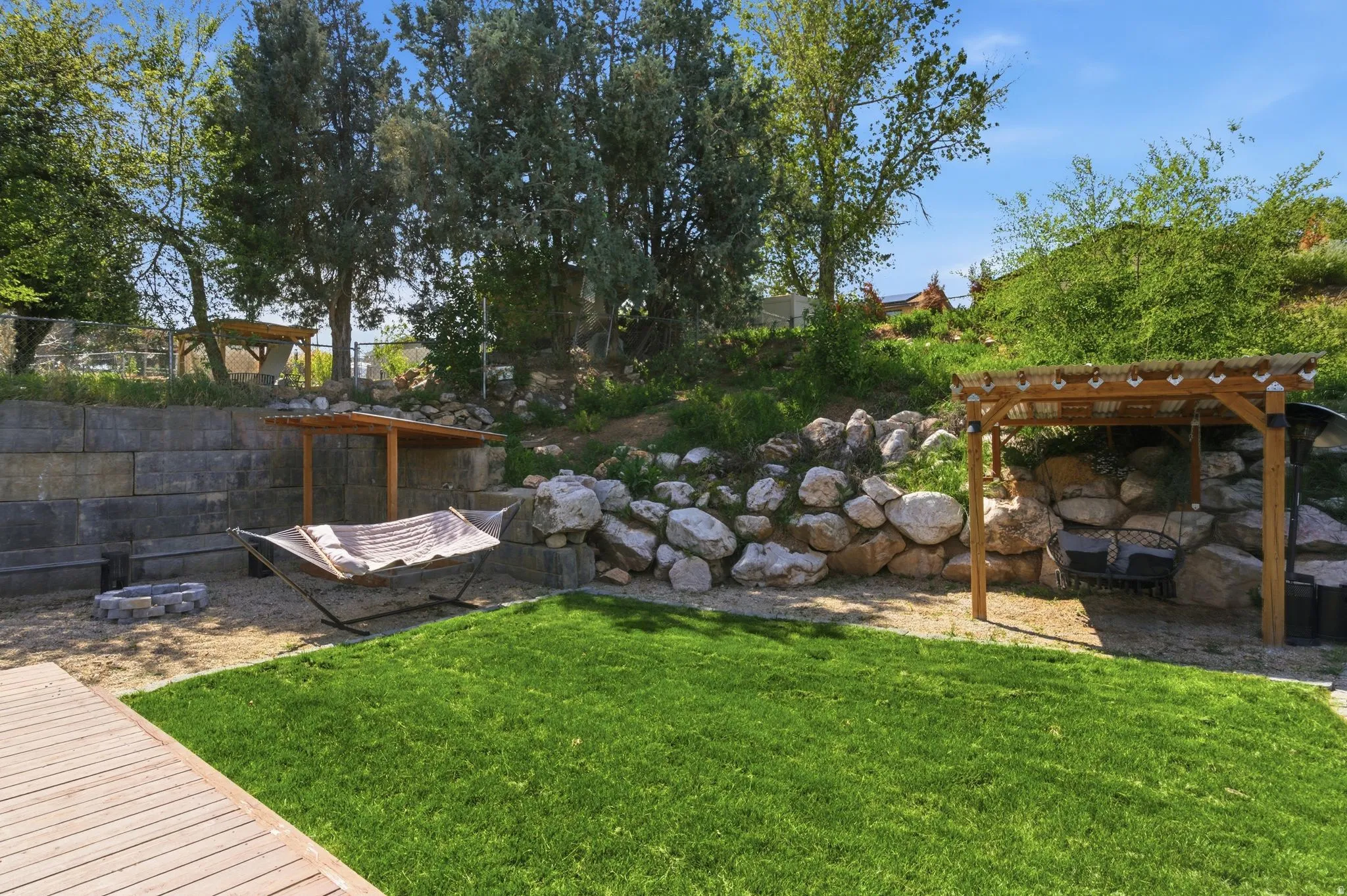 View of yard with a pergola and a patio area