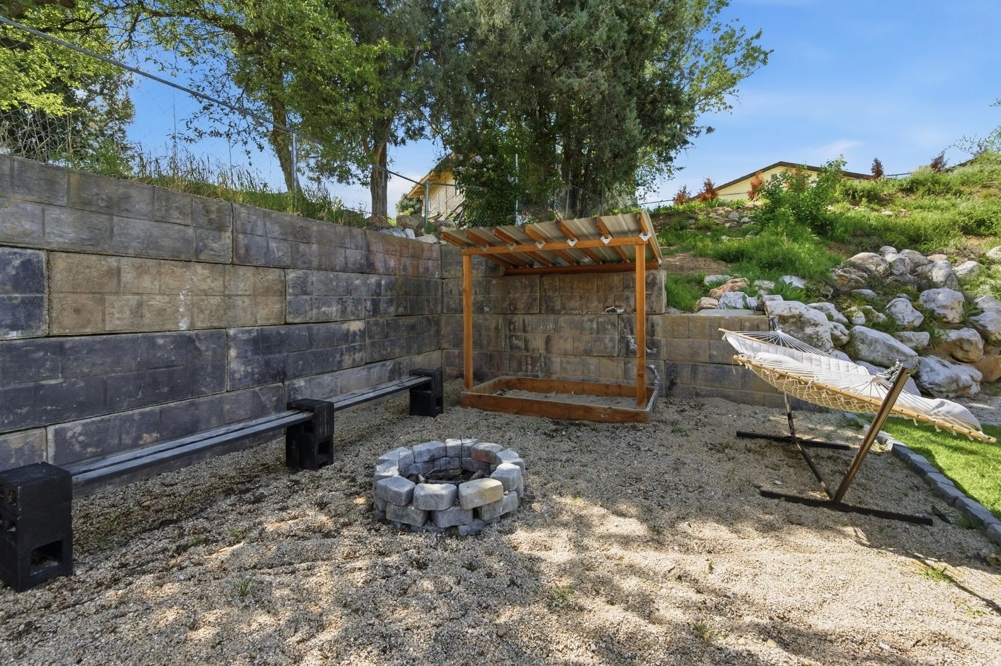View of yard with an outdoor fire pit