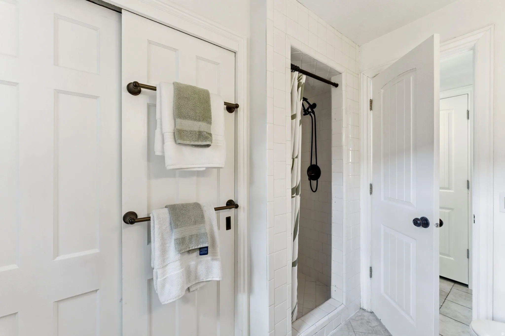 Full bath with a shower stall