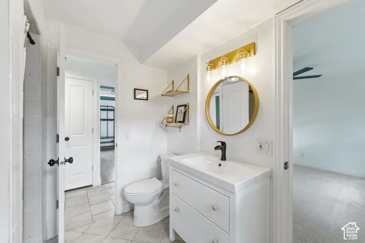 Bathroom with vanity and toilet