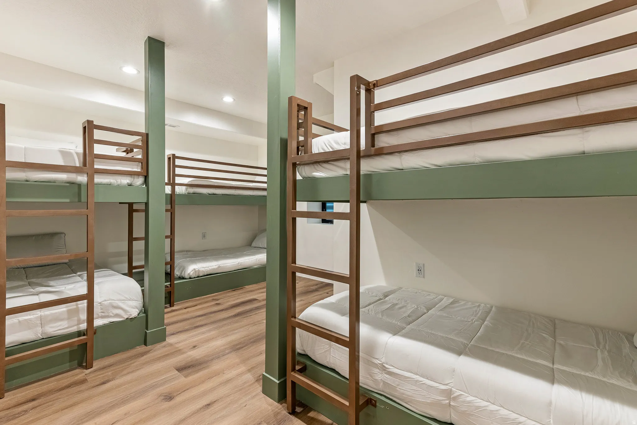 Unfurnished bedroom with light wood-style flooring and recessed lighting