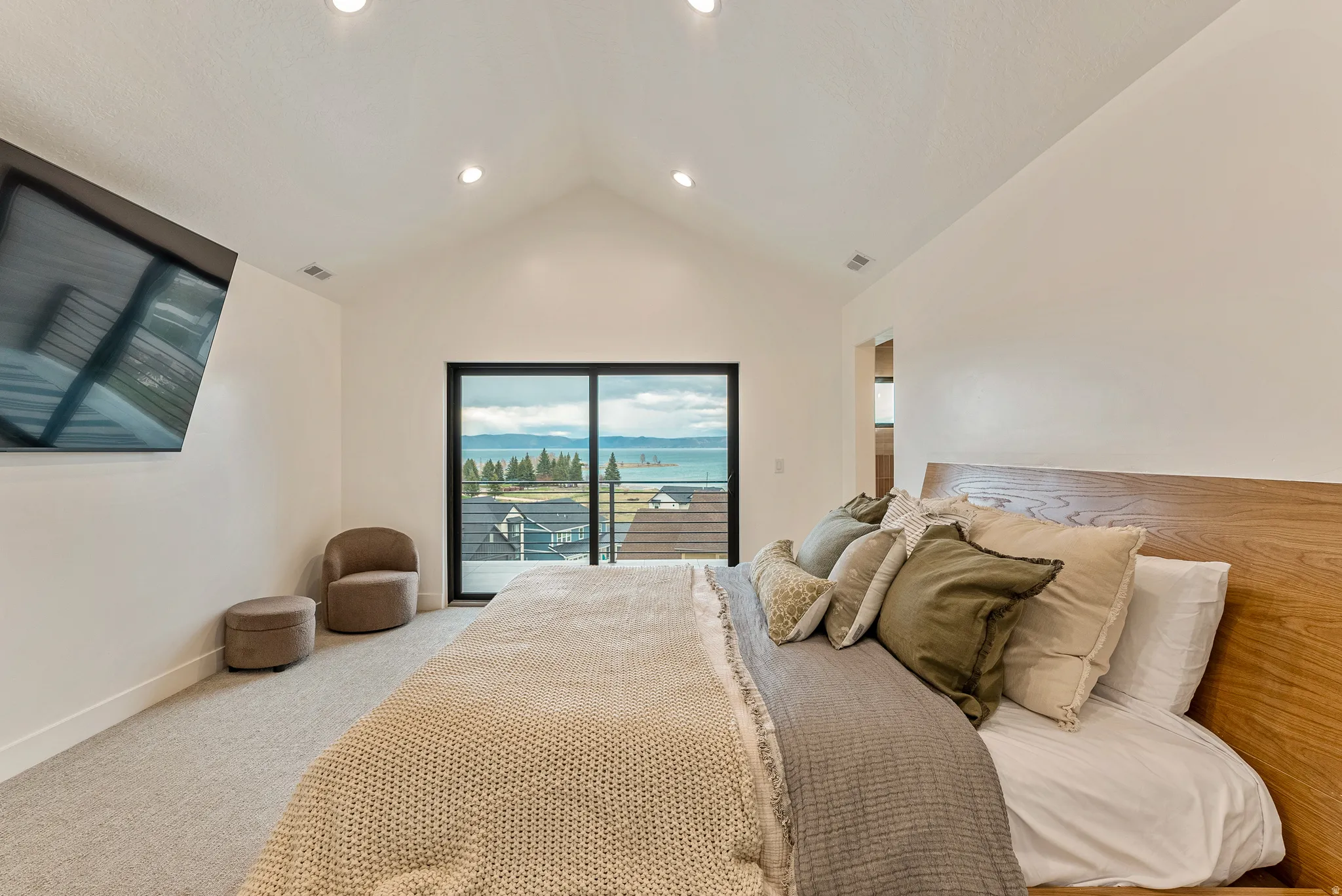 Carpeted bedroom with access to exterior and recessed lighting