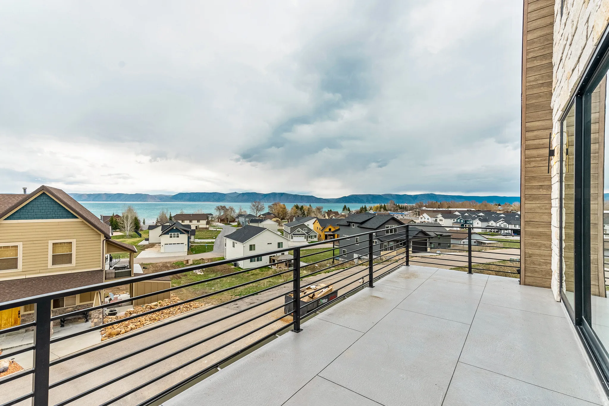 Balcony with a mountain view and a residential view