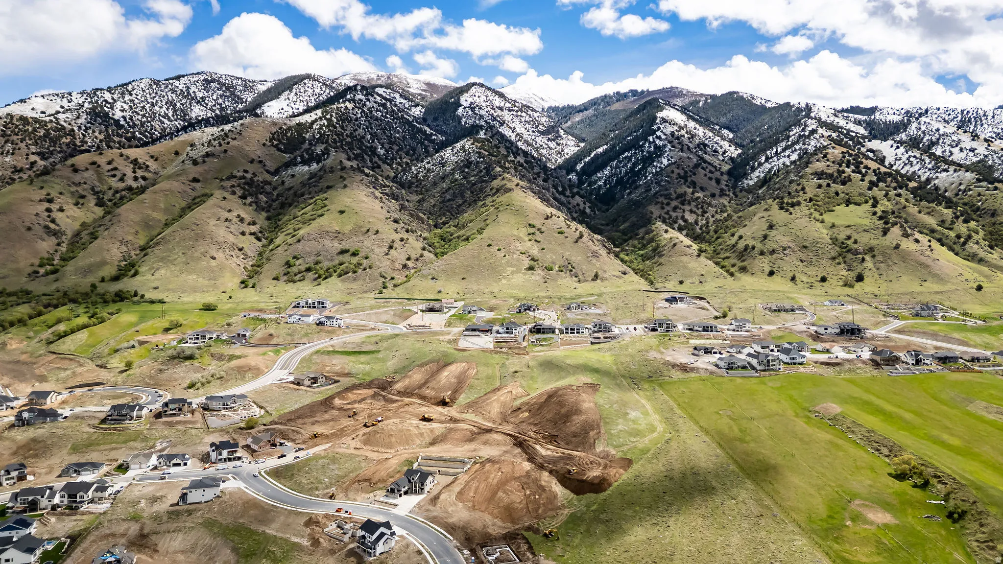 Mountain view featuring nearby suburban area