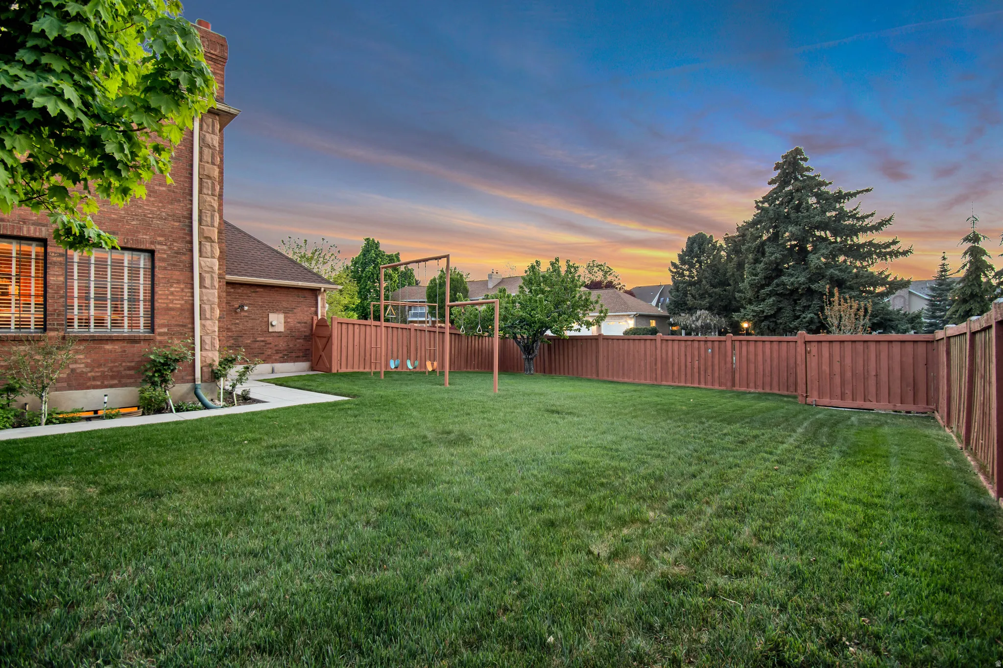 View of fenced backyard