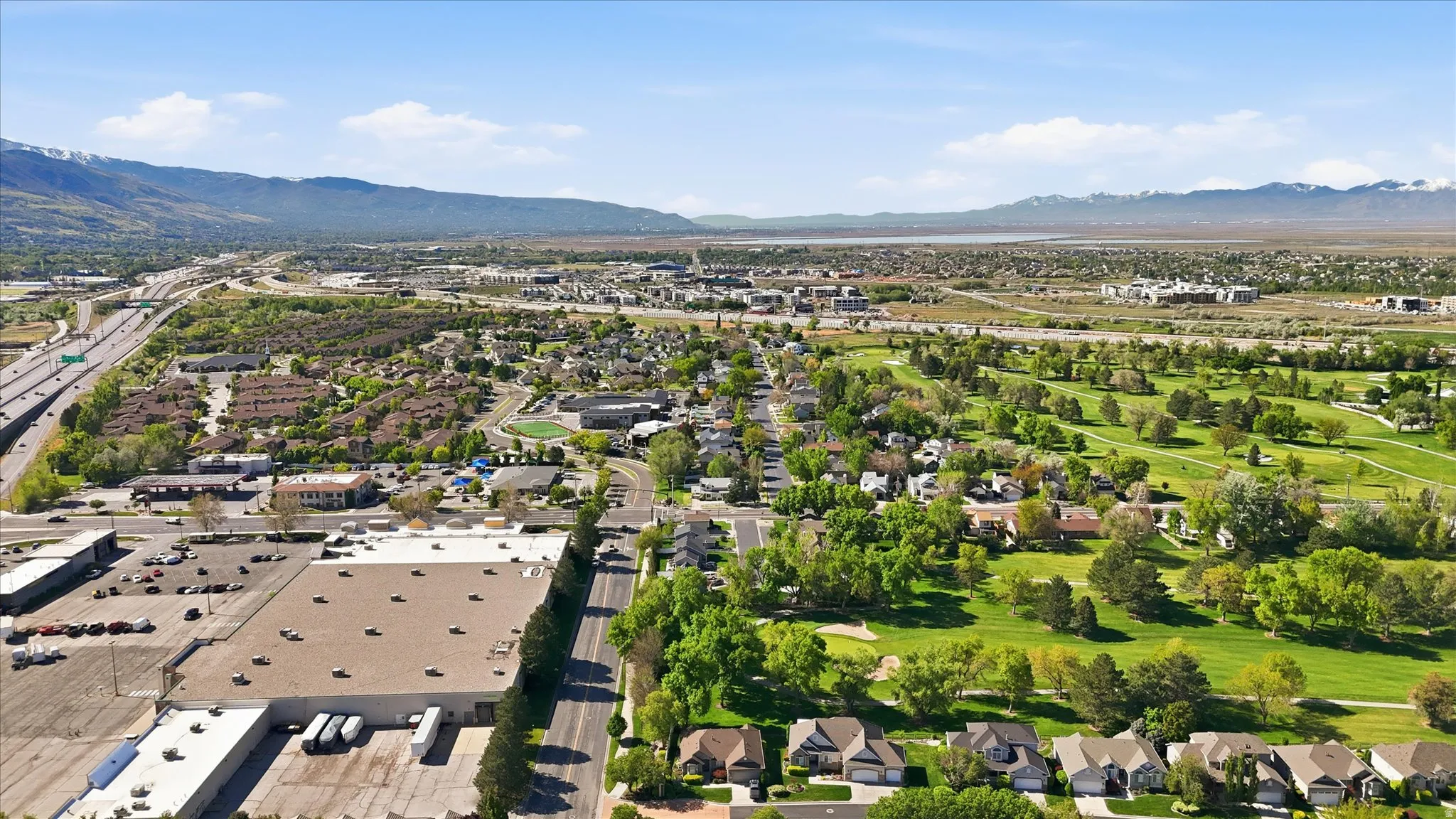 Aerial view of residential area with a mountainous background