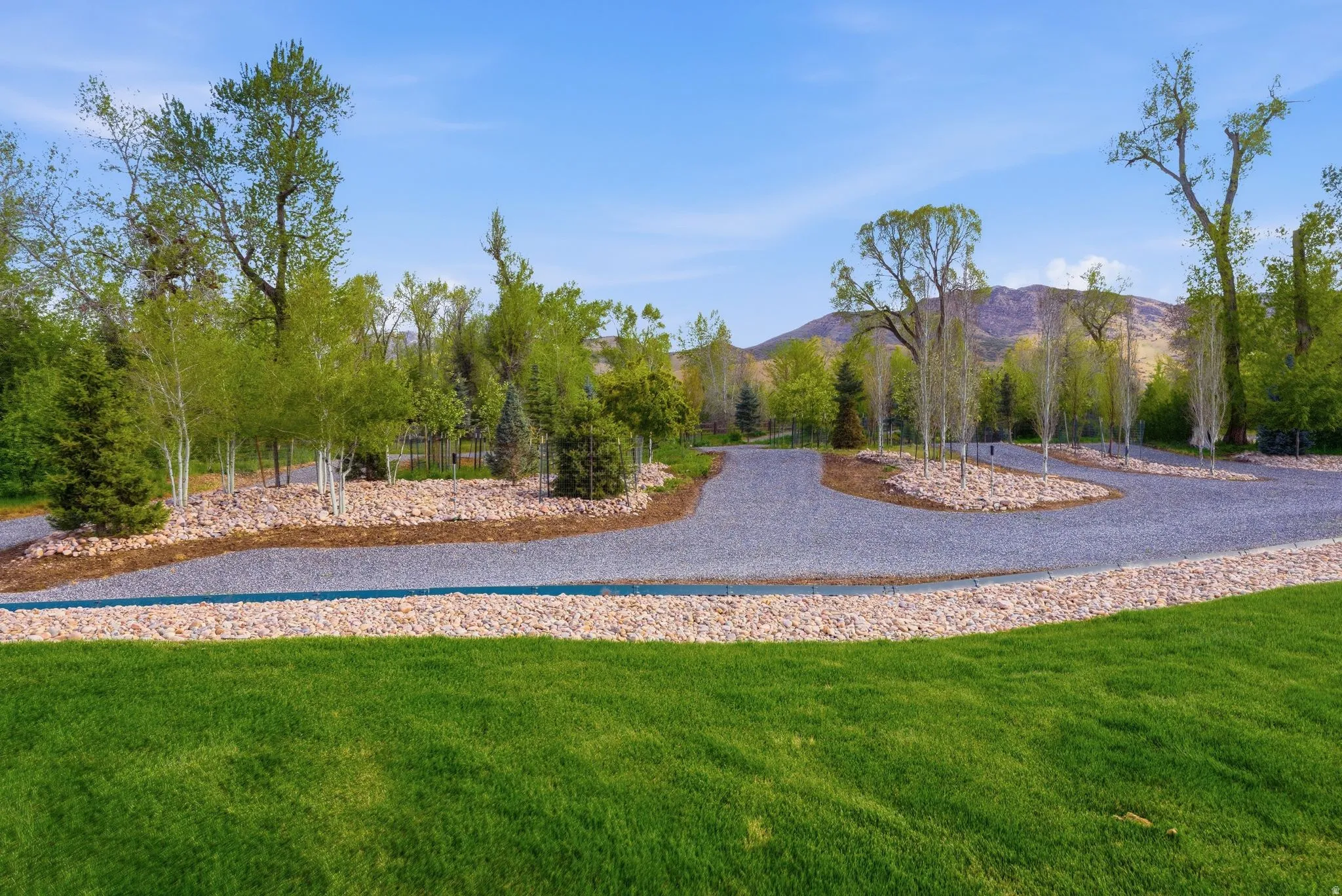 Surrounding community featuring a mountain view
