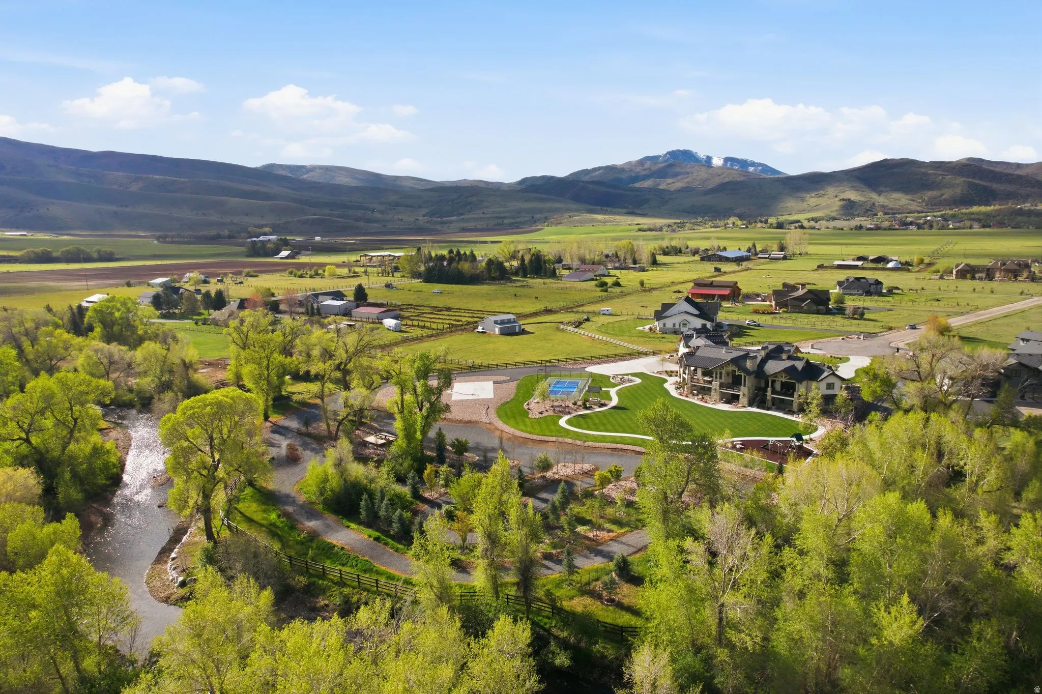 Aerial view of sparsely populated area with mountains